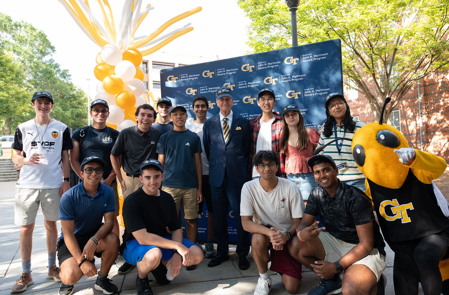 Martinson is pictured center with students from the John H. Martinson Honors Program. Photo by Joya Chapman.