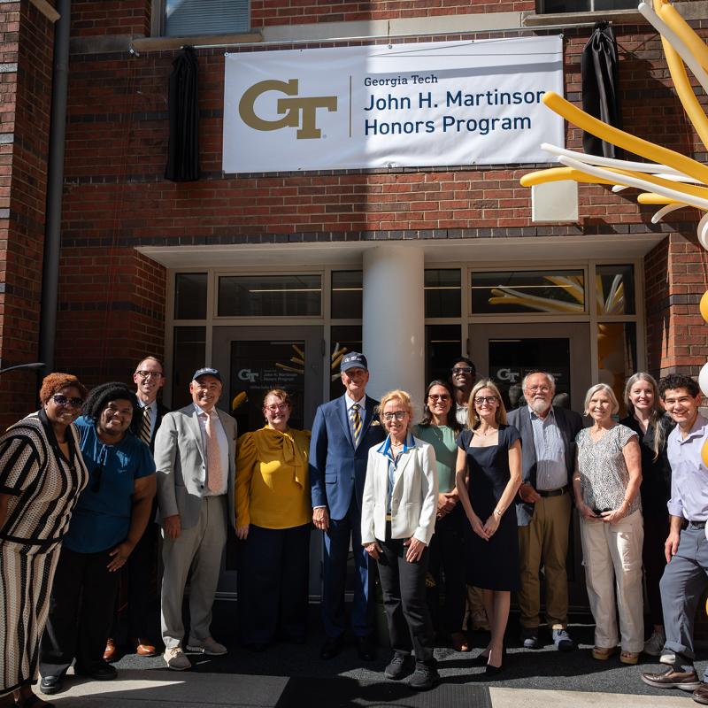 A celebration took place for the naming of the John H. Martinson Honors Program on Aug. 27, with Martinson pictured center. Photo by Joya Chapman.